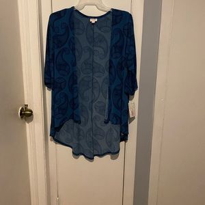Medium size, lularoe, blue background with black design